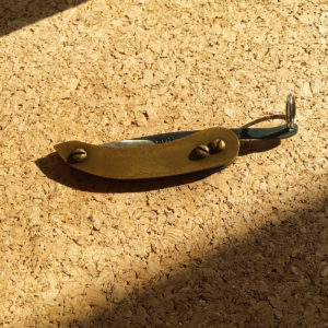 brass folding knife closed